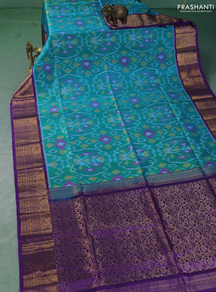 Ikat soft silk saree teal green and violet with allover ikat weaves and zari woven border