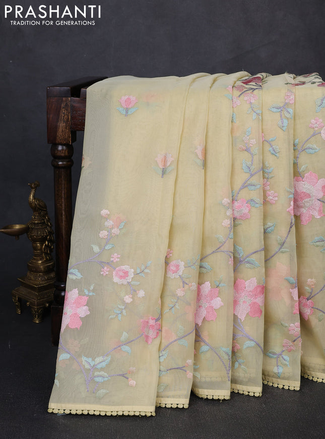 pale yellow with floral embroidery work and crocia lace work border