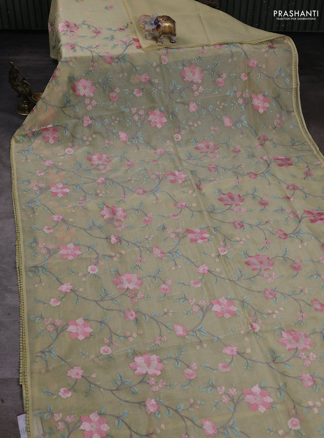 pale yellow with floral embroidery work and crocia lace work border