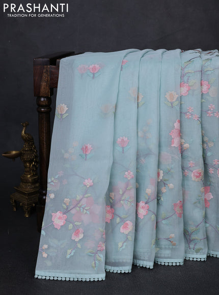 mild teal blue with floral embroidery work and crocia lace work border