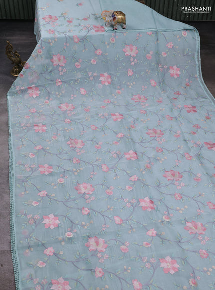 mild teal blue with floral embroidery work and crocia lace work border