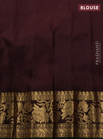 Pure gadwal silk saree orange and coffee brown with zari woven buttas and temple design zari woven border