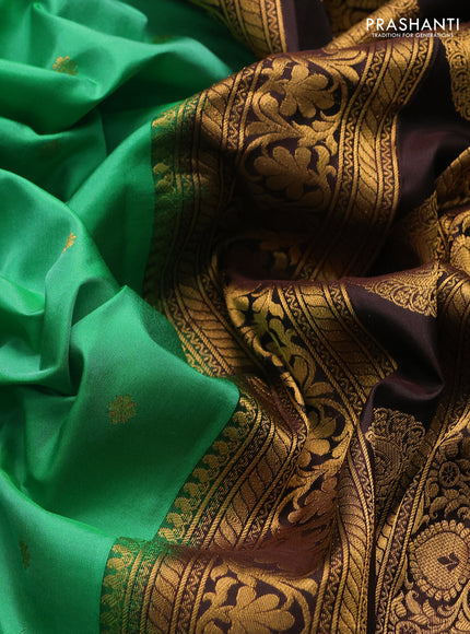 Pure gadwal silk saree teal green and coffee brown with zari woven buttas and temple design zari woven border