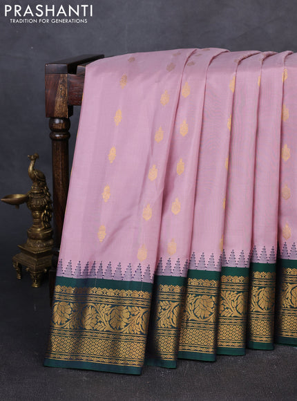 Pure gadwal silk saree pastel pink and green with zari woven buttas and temple design zari woven border