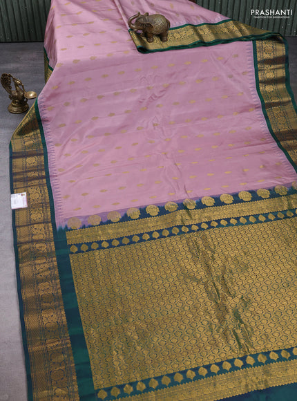 Pure gadwal silk saree pastel pink and green with zari woven buttas and temple design zari woven border