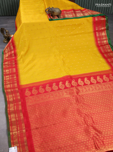 Pure gadwal silk saree yellow and red with allover zari wove buttas and temple design zari woven border