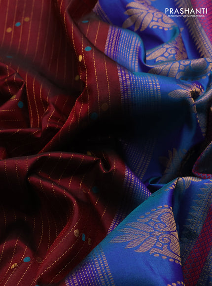 Pure gadwal silk saree deep maroon and dual tone teal greenish blue with allover zari stripe pattern & buttas and temple design zari woven border
