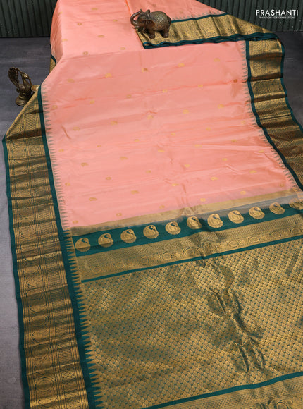 Pure gadwal silk saree peach and bottle green with zari woven buttas and temple design zari woven border