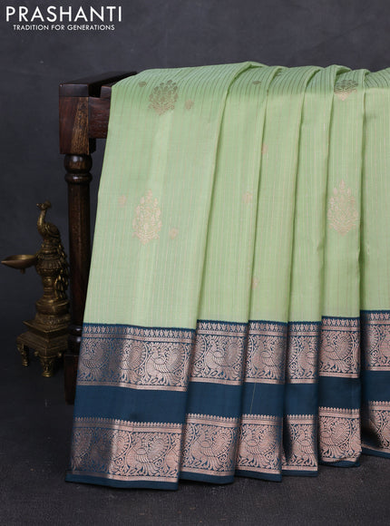 Pure gadwal silk saree pista green and peacock green with allover zari weaves & buttas and rettapet zari woven border