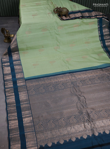 Pure gadwal silk saree pista green and peacock green with allover zari weaves & buttas and rettapet zari woven border