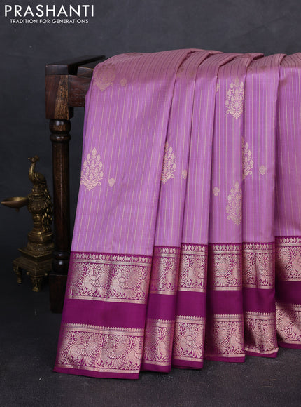 Pure gadwal silk saree pastel purple and wine shade with allover zari weaves & buttas and rettapet zari woven border