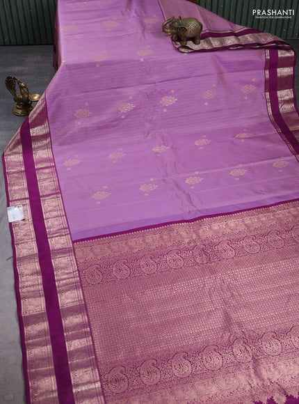 Pure gadwal silk saree pastel purple and wine shade with allover zari weaves & buttas and rettapet zari woven border