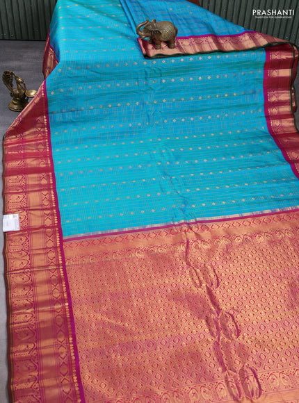 Pure gadwal silk saree dual tone teal blue and magenta pink with allover zari checks & buttas and rich zari woven border