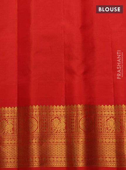 Pure gadwal silk saree pista green and orange with annam & rudhraksha zari woven buttas and temple design zari woven border