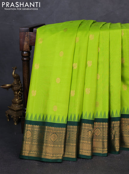 Pure gadwal silk saree light green and bottle green with zari woven buttas and temple design zari woven border