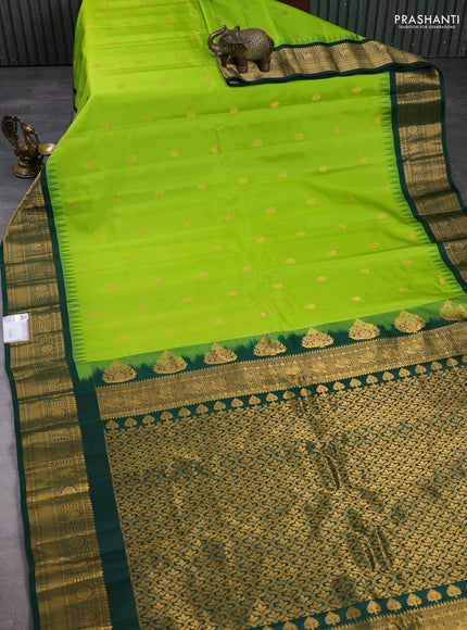 Pure gadwal silk saree light green and bottle green with zari woven buttas and temple design zari woven border