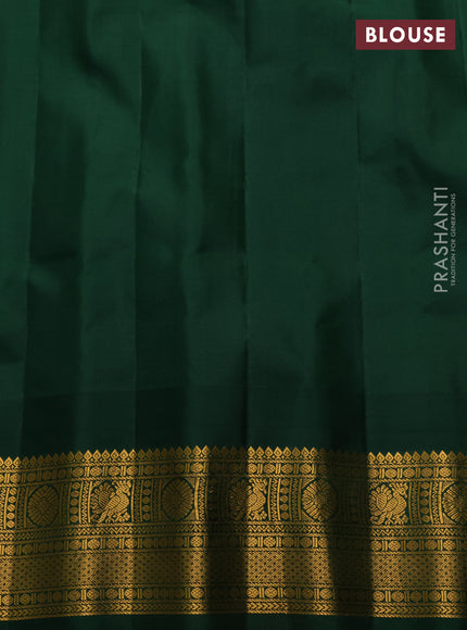 Pure gadwal silk saree light green and bottle green with zari woven buttas and temple design zari woven border