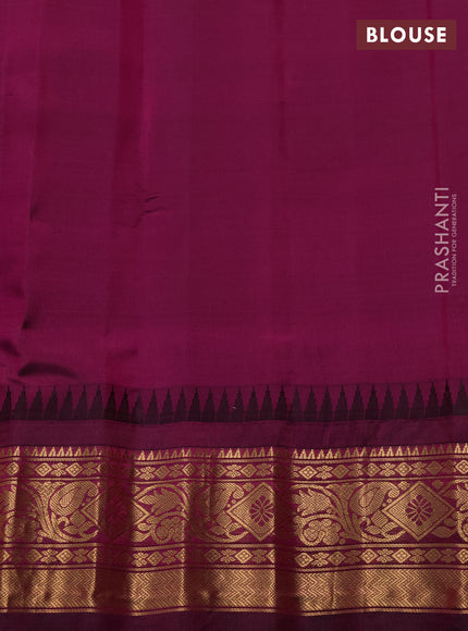 Pure gadwal silk saree mango yellow and purple with allover zari checks & buttas and temple design zari woven border