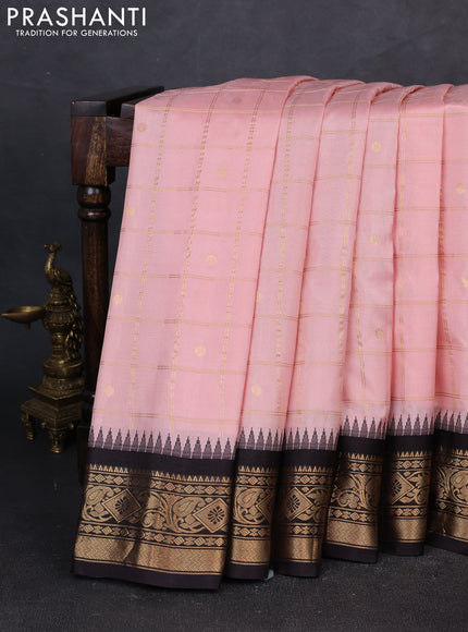 Pure gadwal silk saree mild peach and coffee brown with allover zari checks & buttas and temple design zari woven border