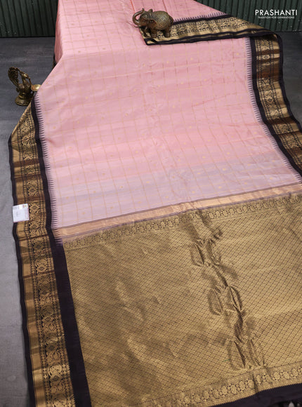 Pure gadwal silk saree mild peach and coffee brown with allover zari checks & buttas and temple design zari woven border