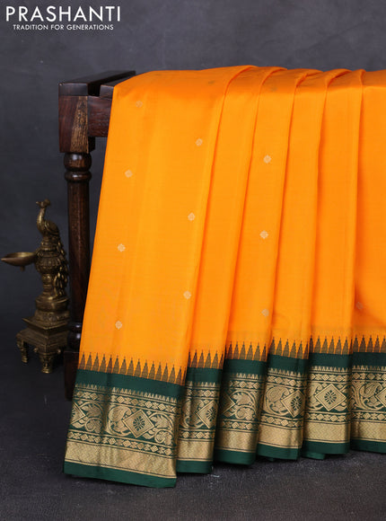Pure gadwal silk saree mango yellow and bottle green with zari woven buttas and temple design zari woven border
