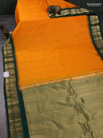 Pure gadwal silk saree mango yellow and bottle green with zari woven buttas and temple design zari woven border