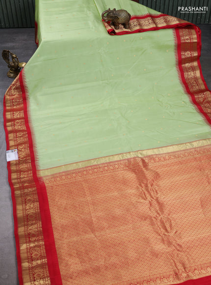 Pure gadwal silk saree pista green and red with zari woven buttas and temple design zari woven border