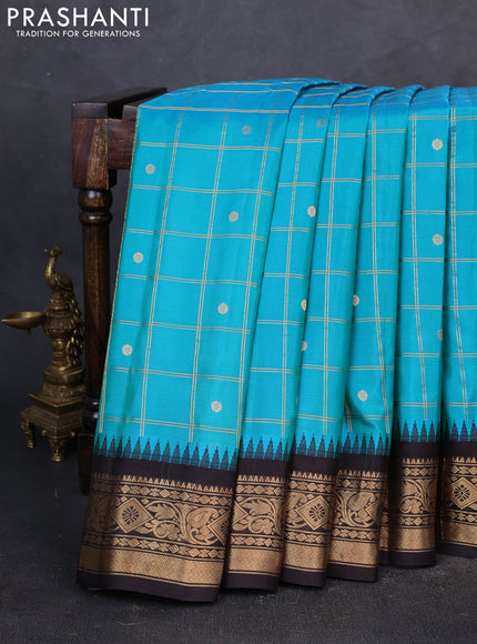 Pure gadwal silk saree teal blue and coffee brown with allover zari checks & buttas and temple design zari woven border