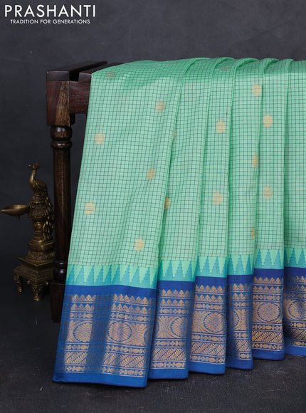 Pure gadwal silk saree mild teal green and cs blue with allover checks & zari buttas and temple design zari woven border