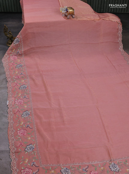 Organza saree peach with allover zari stripe pattern and floral convent embroidery border