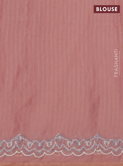 Organza saree peach with allover zari stripe pattern and floral convent embroidery border