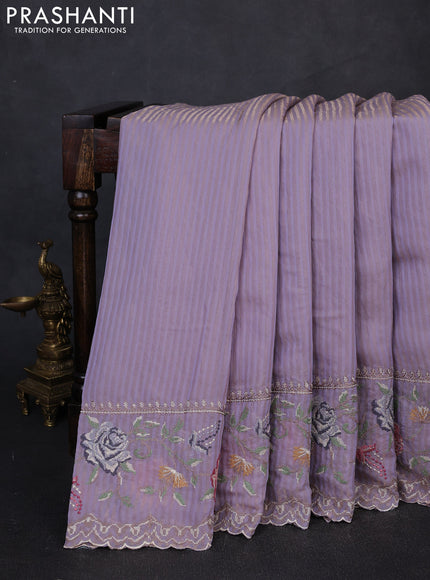 Organza saree pastel lavender with allover zari stripe pattern and floral convent embroidery border