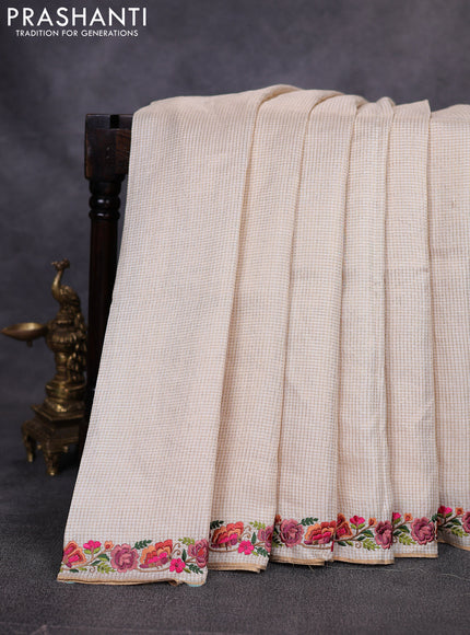Pure tussar saree off white with allover small zari woven checked pattern and embroidery border