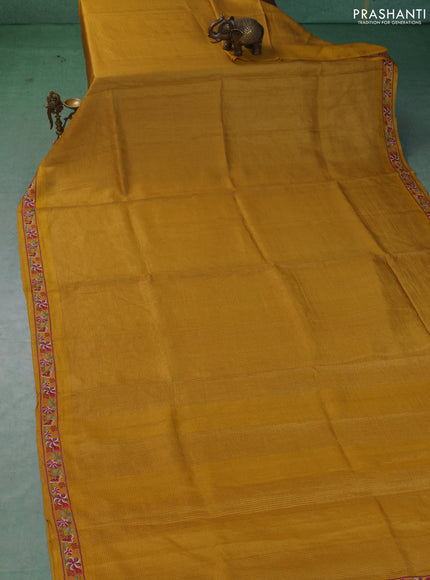 Pure tussar saree yellow with allover small zari woven checked pattern and embroidery border