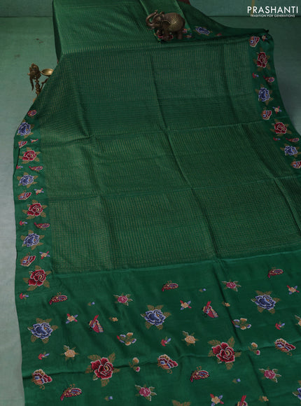 Pure tussar saree green with allover zari checks & buttas and embroidery border
