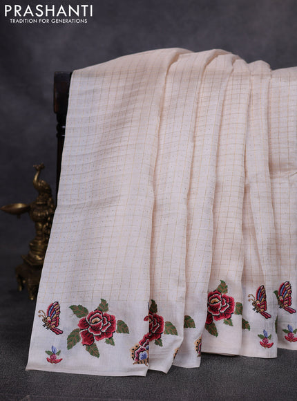 Pure tussar saree cream with allover zari checks & buttas and embroidery border
