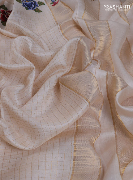 Pure tussar saree cream with allover zari checks & buttas and embroidery border