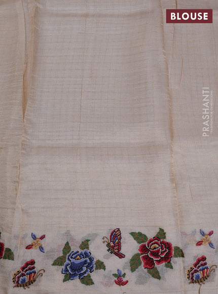 Pure tussar saree cream with allover zari checks & buttas and embroidery border