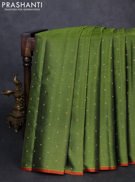 Pure kanchipuram silk saree mehendi green and orange with zari woven buttas and piping border