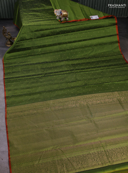 Pure kanchipuram silk saree mehendi green and orange with zari woven buttas and piping border