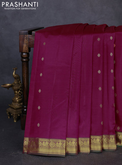 Pure kanchipuram silk saree dark magenta pink and green with zari woven buttas and zari woven border