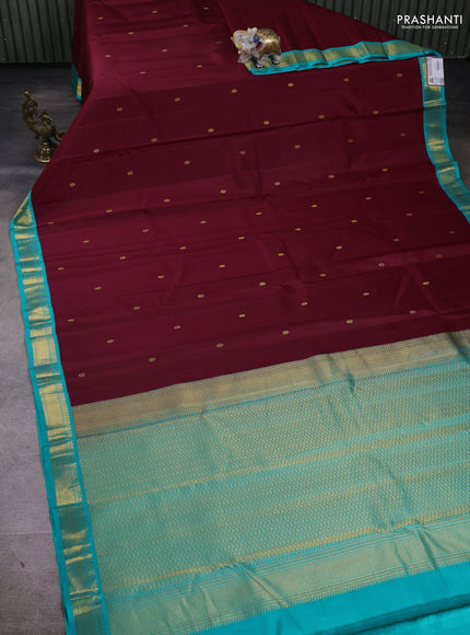 Pure kanchipuram silk saree maroon and teal blue with zari woven buttas and zari woven border