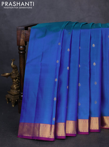 Pure kanchipuram silk saree dual shade of teal blue and purple with zari woven buttas and zari woven border