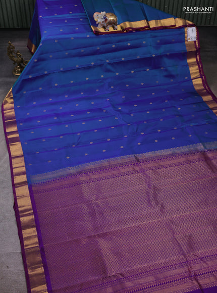 Pure kanchipuram silk saree dual shade of teal blue and purple with zari woven buttas and zari woven border
