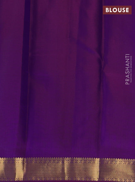 Pure kanchipuram silk saree dual shade of teal blue and purple with zari woven buttas and zari woven border