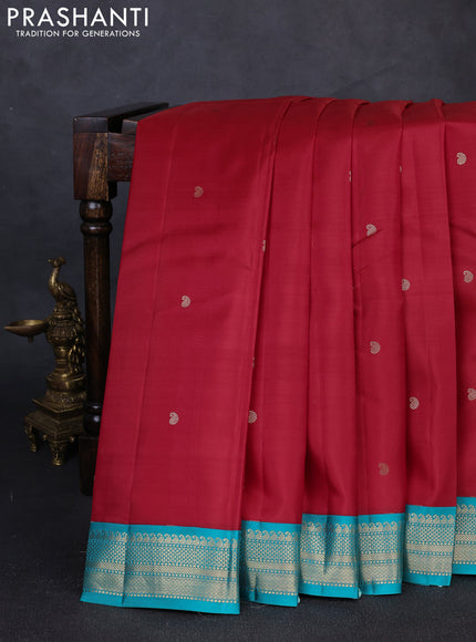 Pure kanchipuram silk saree red and teal blue with zari woven buttas and zari woven korvai border