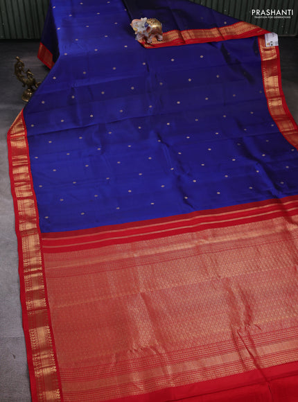Pure kanchipuram silk saree blue and red with zari woven buttas and zari woven korvai border