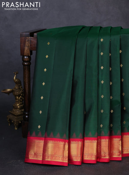 Pure kanchipuram silk saree green and reddish pink with zari woven buttas and zari woven korvai border