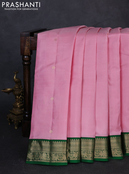 Pure kanchipuram silk saree peach pink and green with allover zari weaves and zari woven korvai border