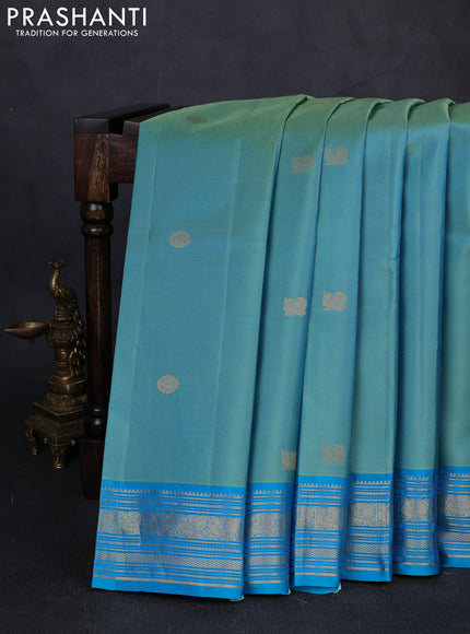 Pure kanchipuram silk saree teal blue with allover zari weaves and zari woven border